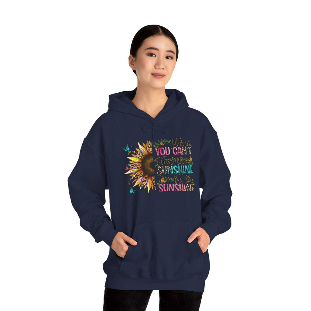 woman wearing navy blue sunflower quote hoodie with inspirational colorful text and sunflower graphic design