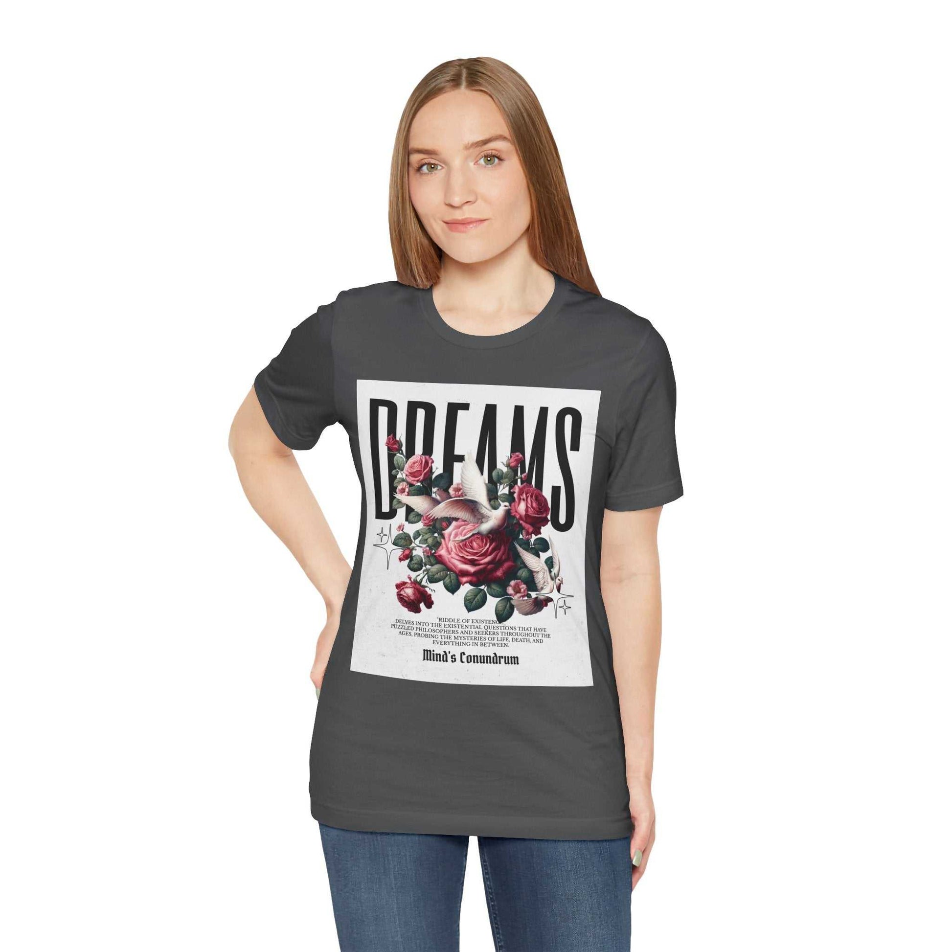 Woman wearing dark Dreams Floral Tee with rose graphic and bold typography on front