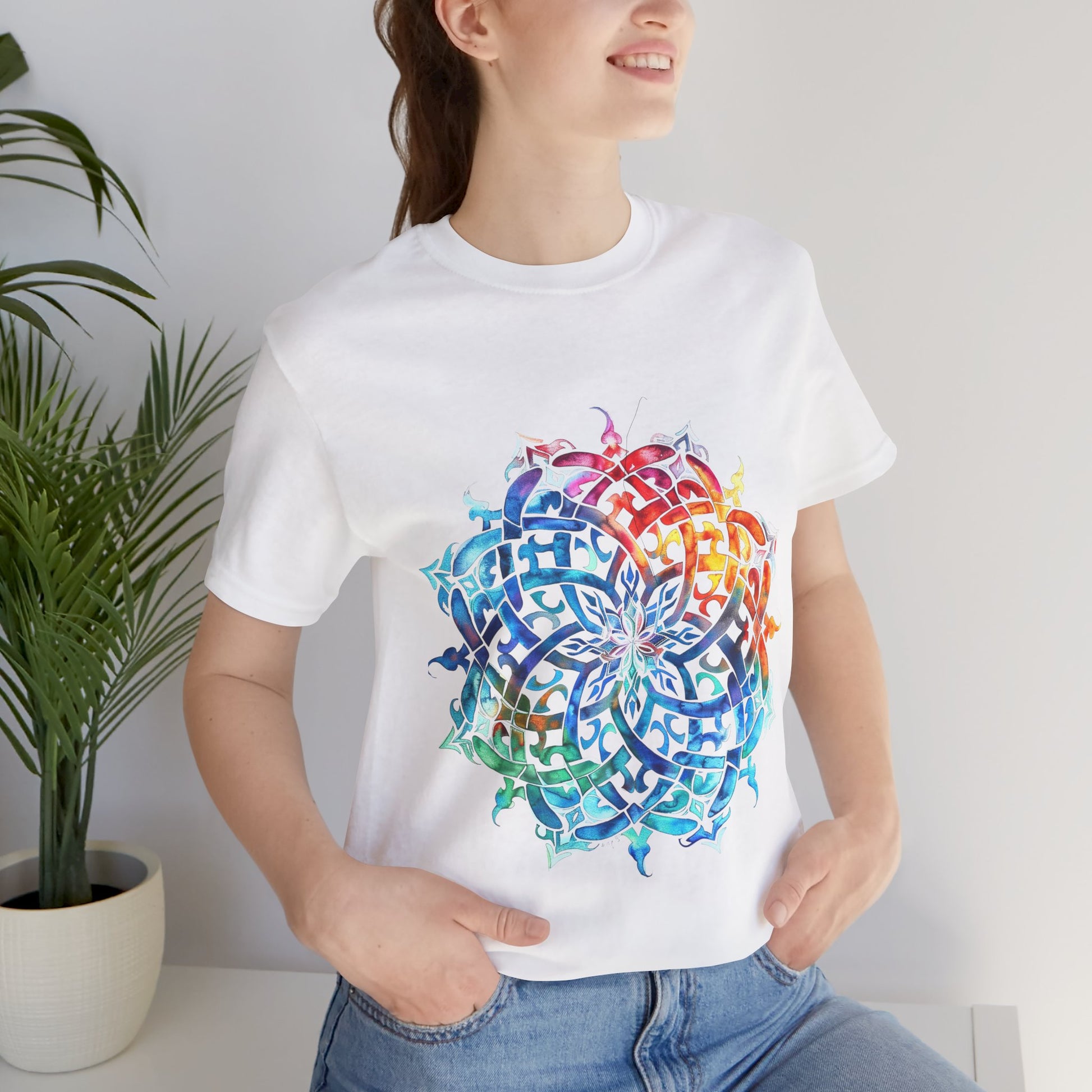 Artistic tee with a radiant rainbow mandala design, available in vibrant color options