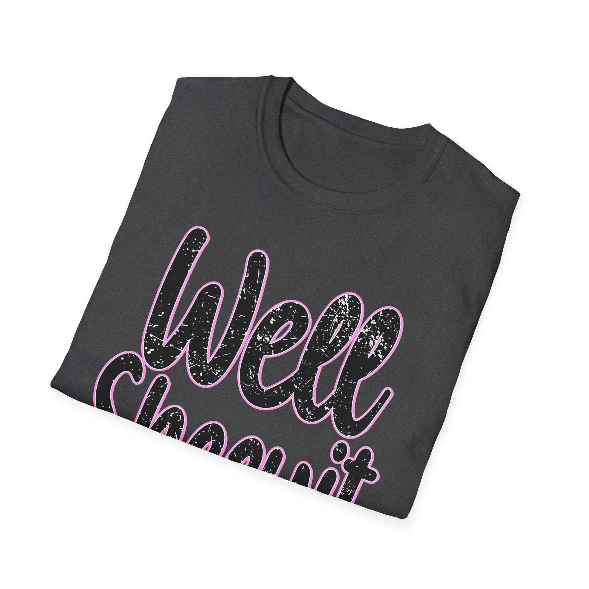Folded black casual statement tee with "Well Sheeyit" funny quote graphic and pink outline design