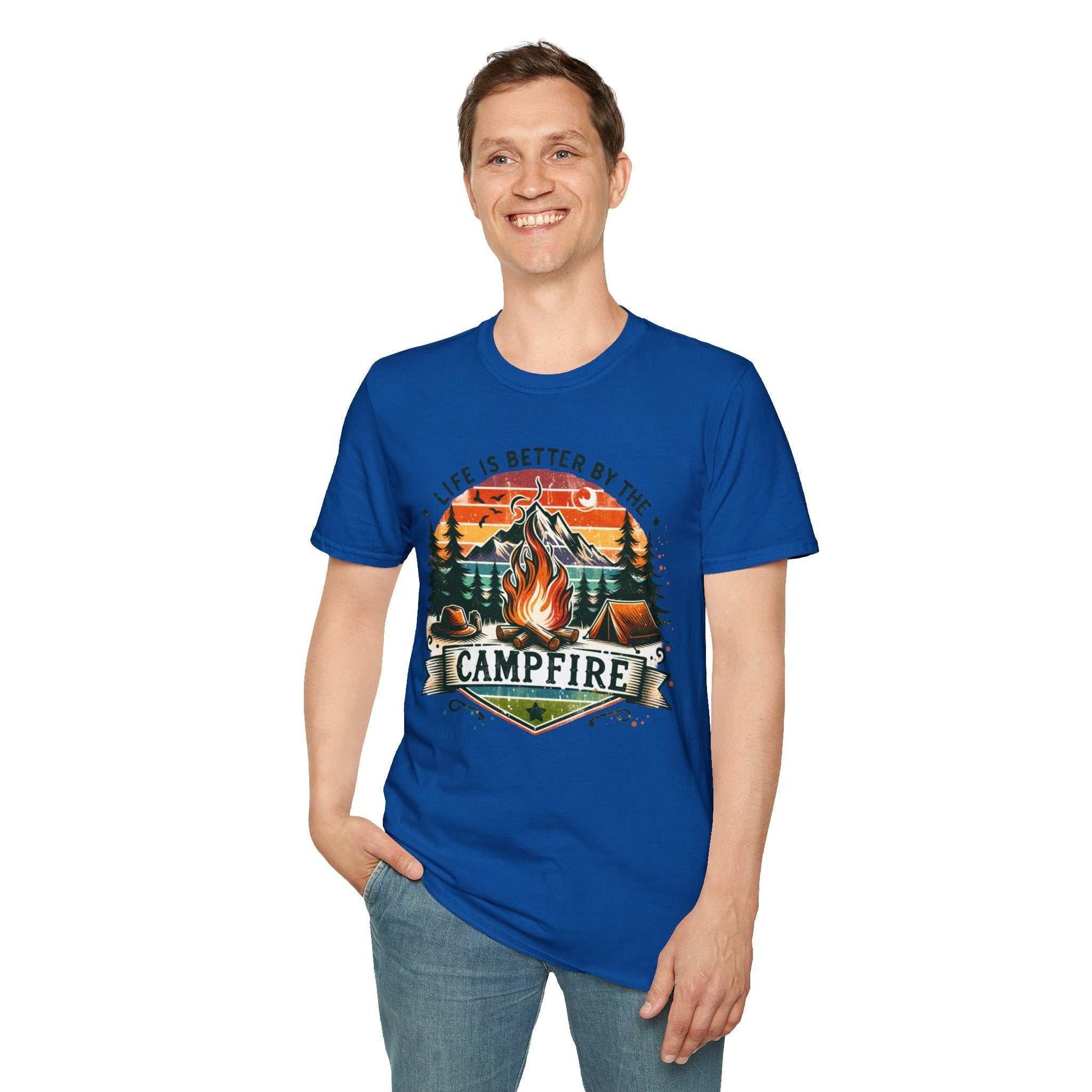 Man wearing blue Camping Adventure Unisex T-Shirt with "Life is Better by the Campfire" campfire design