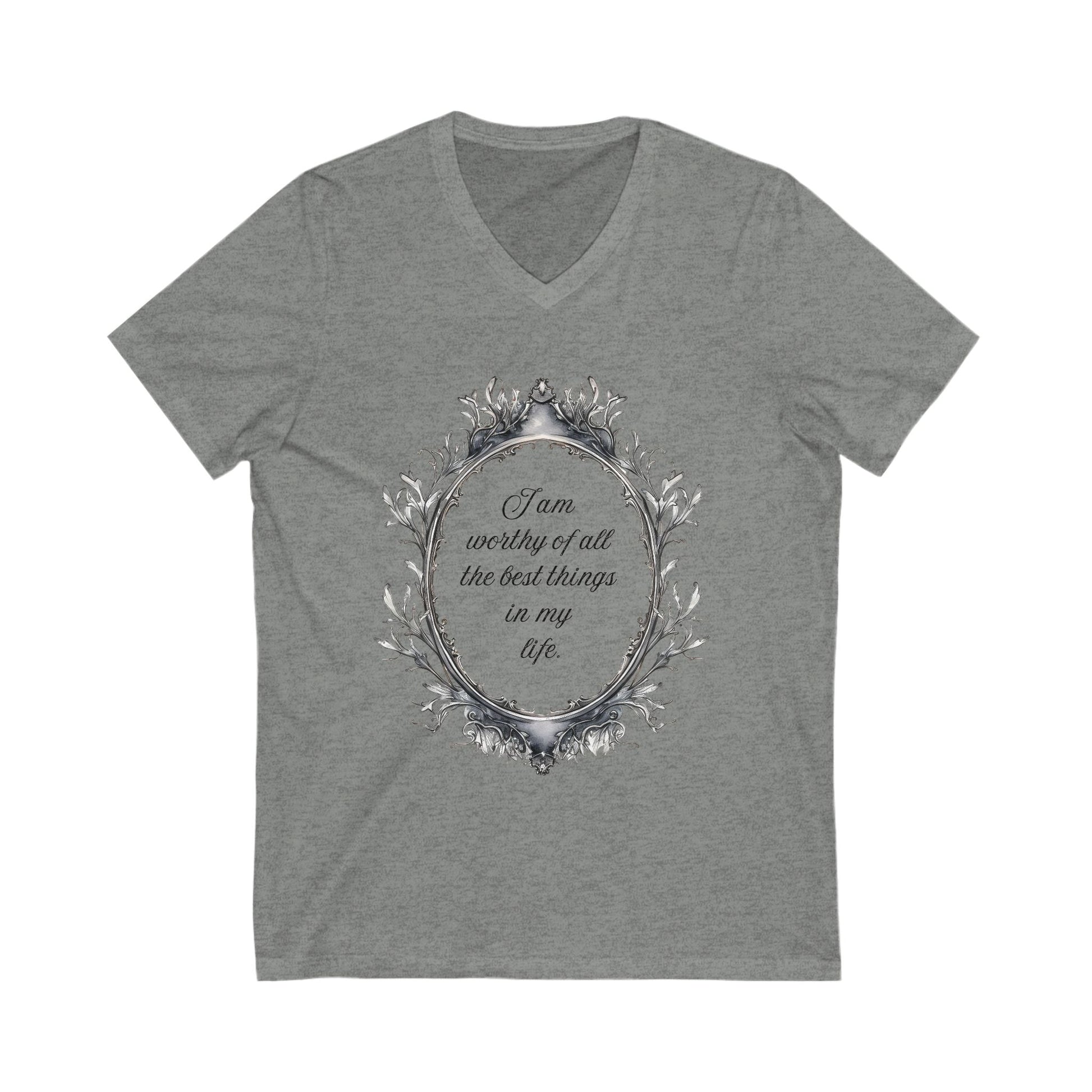 Grey V-neck tee with positive affirmation text "I am worthy of all the best things in my life" inside decorative frame design