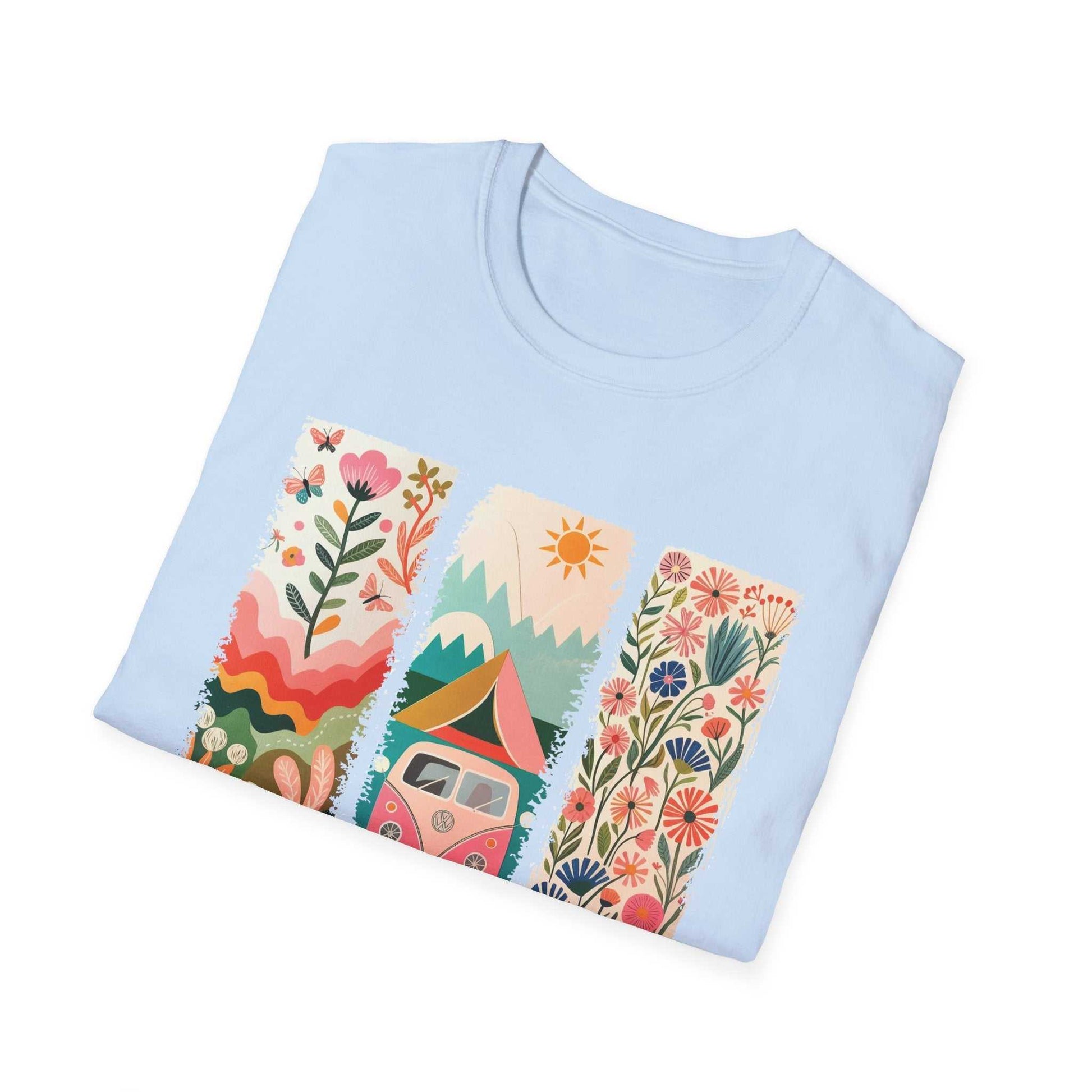 Light blue unisex softstyle t-shirt with colorful camping adventure print featuring mountains, a tent, and floral designs.