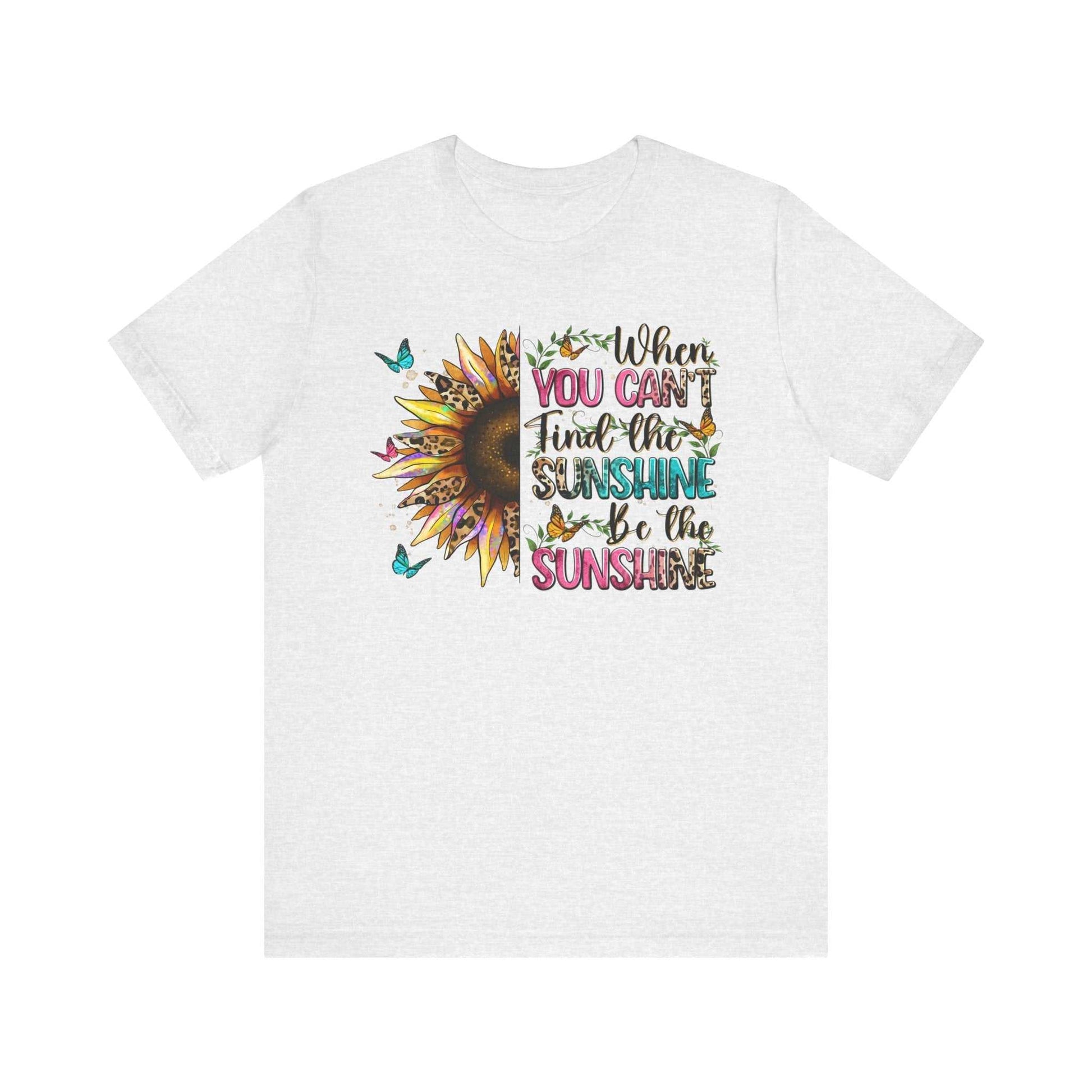 White Sunshine Quote Tee with colorful sunflower and uplifting text design, unisex short sleeve cotton shirt