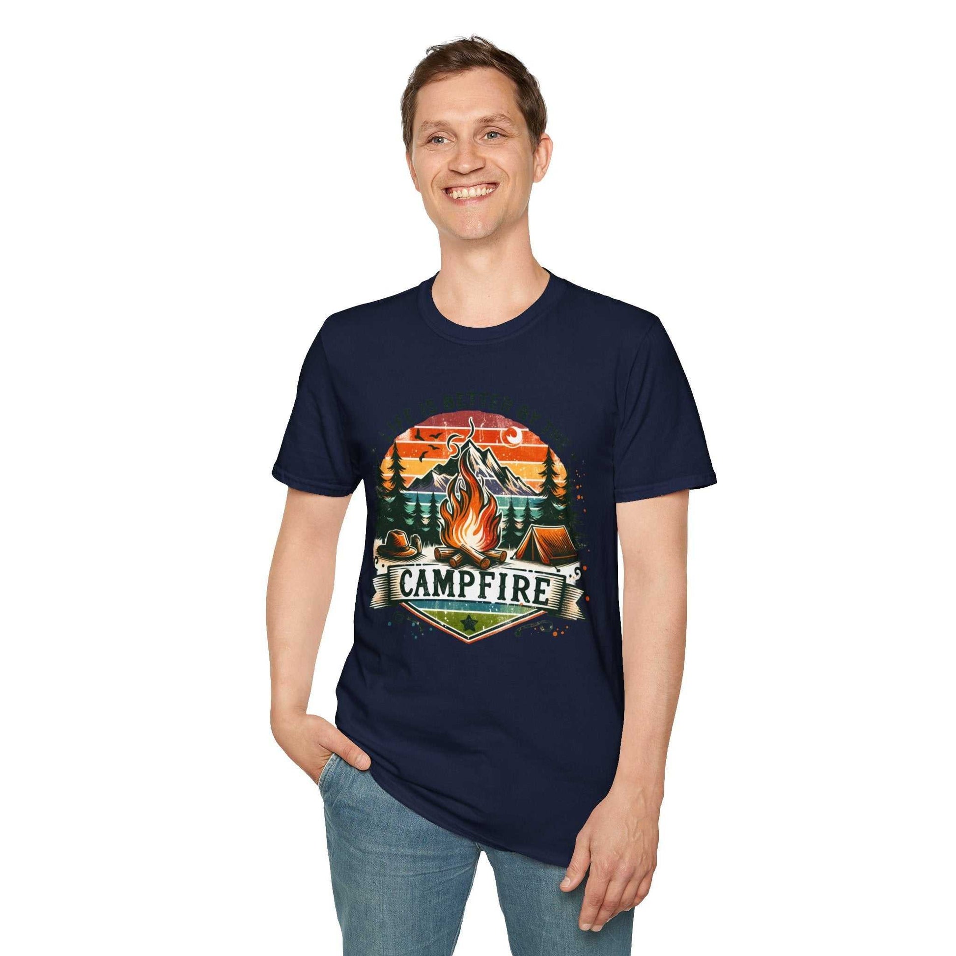 Man wearing navy Camping Adventure Unisex T-Shirt with vibrant campfire and forest design, smiling, casual fit.