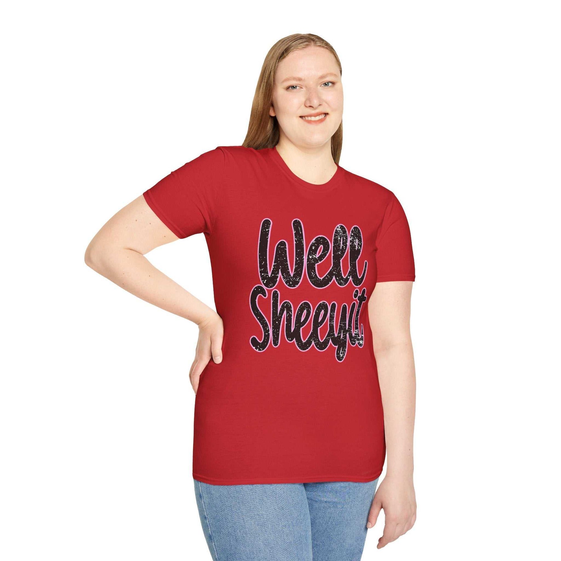 Woman wearing red casual statement tee with "Well Sheeyit" funny quote text on front