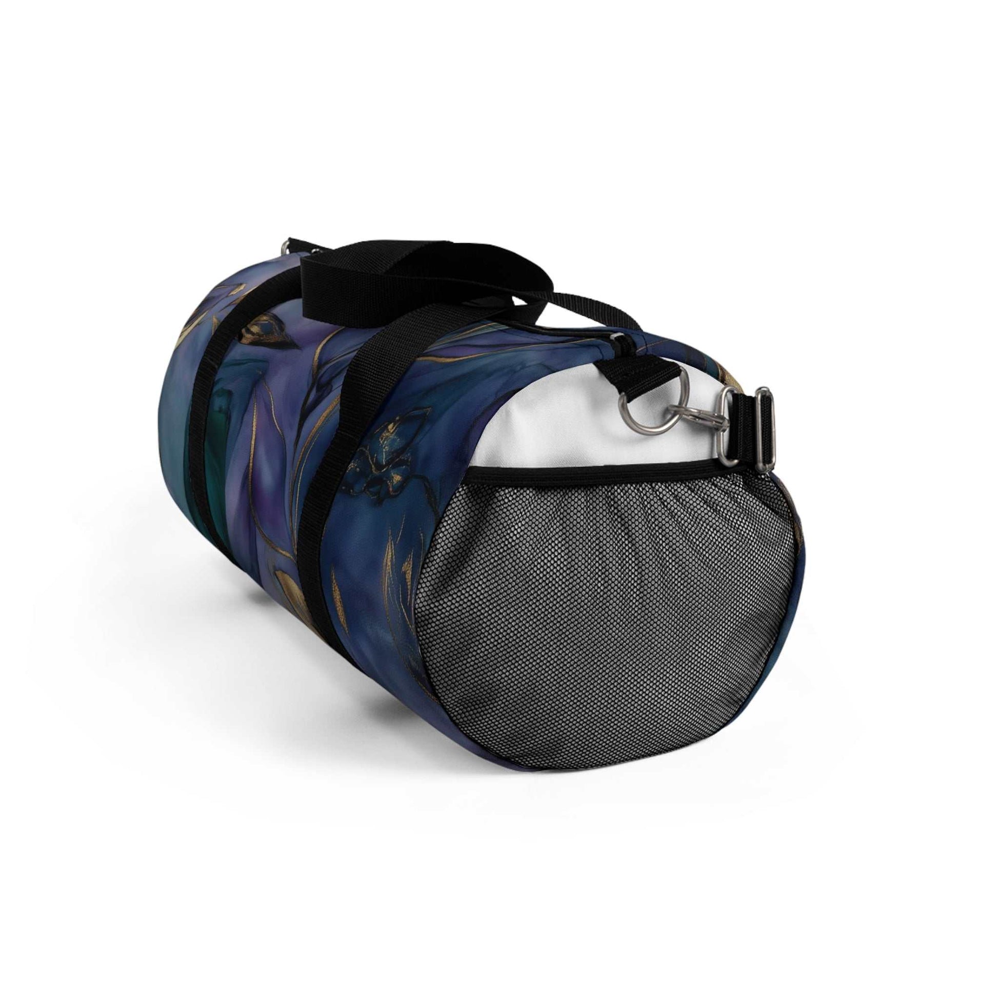 Elegant floral duffel bag with black handles and mesh side pocket, designed for travel and fitness use.
