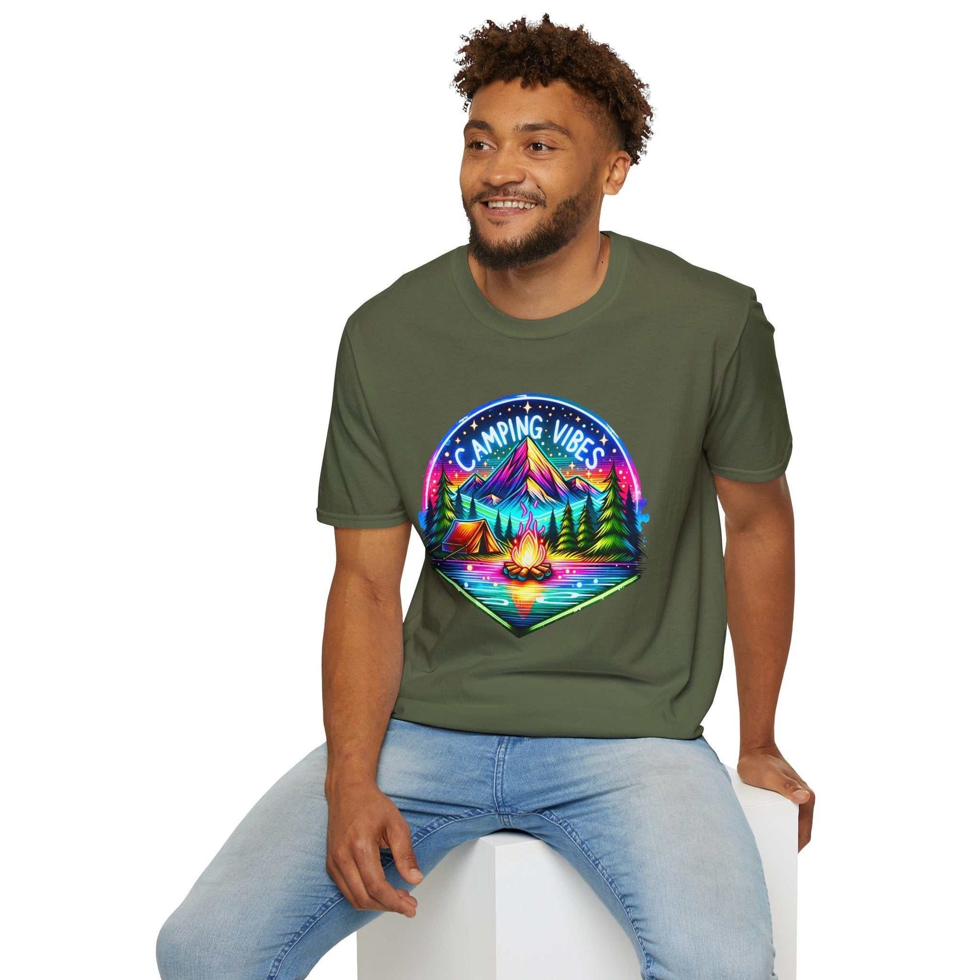 Man wearing olive green Camping Vibes unisex softstyle t-shirt with colorful camping graphic design